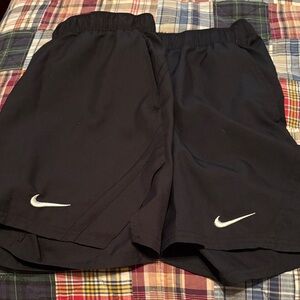 Two pair EUC Nike Black Shorts with White Swoosh - Women’s